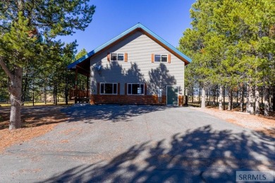 This 3,201 square foot cabin is conveniently located at the IP on Island Park Village Resort Golf Course in Idaho - for sale on GolfHomes.com, golf home, golf lot