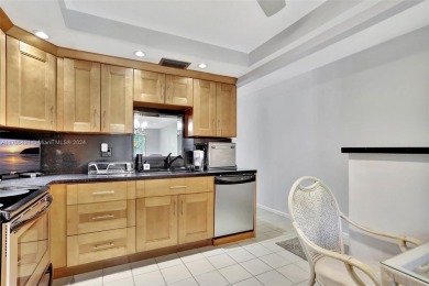 Welcome home to this desirable ground floor condo in one of the on Wynmoor Golf Course in Florida - for sale on GolfHomes.com, golf home, golf lot