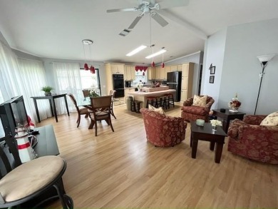 This Casa Grande model home has a view of the golf course from on Del Tura Golf and Country Club in Florida - for sale on GolfHomes.com, golf home, golf lot