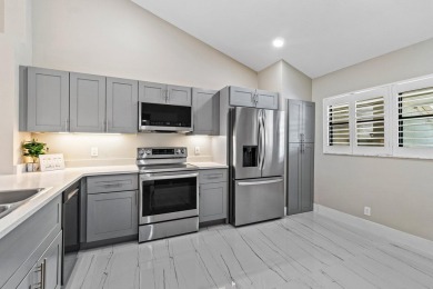 Superior in every way! This stunning fully renovated 2-bedroom on Eastpointe Country Club in Florida - for sale on GolfHomes.com, golf home, golf lot