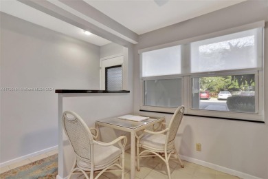 Welcome home to this desirable ground floor condo in one of the on Wynmoor Golf Course in Florida - for sale on GolfHomes.com, golf home, golf lot
