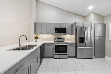 Superior in every way! This stunning fully renovated 2-bedroom on Eastpointe Country Club in Florida - for sale on GolfHomes.com, golf home, golf lot