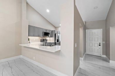 Superior in every way! This stunning fully renovated 2-bedroom on Eastpointe Country Club in Florida - for sale on GolfHomes.com, golf home, golf lot