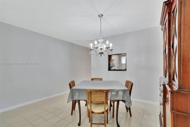 Welcome home to this desirable ground floor condo in one of the on Wynmoor Golf Course in Florida - for sale on GolfHomes.com, golf home, golf lot