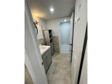 Modern updated nice apartment with two large bedrooms and a on Palmetto Golf Course in Florida - for sale on GolfHomes.com, golf home, golf lot