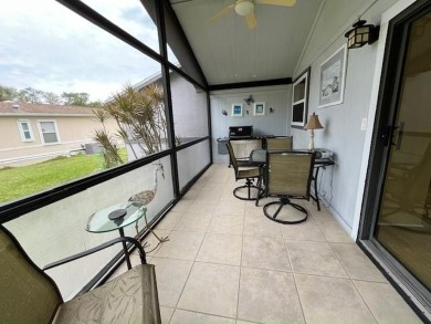 This Casa Grande model home has a view of the golf course from on Del Tura Golf and Country Club in Florida - for sale on GolfHomes.com, golf home, golf lot