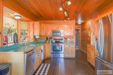 This 3,201 square foot cabin is conveniently located at the IP on Island Park Village Resort Golf Course in Idaho - for sale on GolfHomes.com, golf home, golf lot