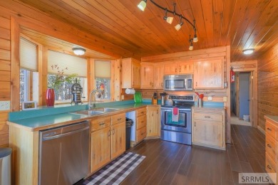 This 3,201 square foot cabin is conveniently located at the IP on Island Park Village Resort Golf Course in Idaho - for sale on GolfHomes.com, golf home, golf lot