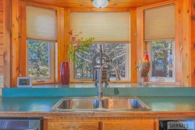 This 3,201 square foot cabin is conveniently located at the IP on Island Park Village Resort Golf Course in Idaho - for sale on GolfHomes.com, golf home, golf lot