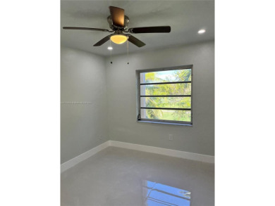 Modern updated nice apartment with two large bedrooms and a on Palmetto Golf Course in Florida - for sale on GolfHomes.com, golf home, golf lot