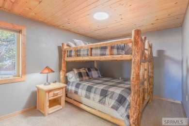 This 3,201 square foot cabin is conveniently located at the IP on Island Park Village Resort Golf Course in Idaho - for sale on GolfHomes.com, golf home, golf lot