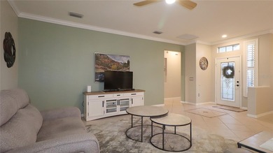 This home shows like a model.  Change in plans and the sellers on Eagle Ridge At Spruce Creek Country Club in Florida - for sale on GolfHomes.com, golf home, golf lot