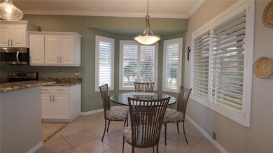 This home shows like a model.  Change in plans and the sellers on Eagle Ridge At Spruce Creek Country Club in Florida - for sale on GolfHomes.com, golf home, golf lot