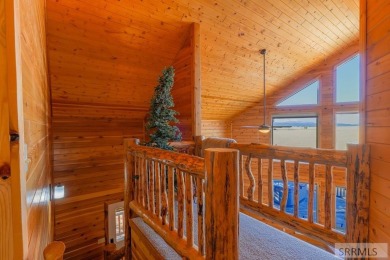 This 3,201 square foot cabin is conveniently located at the IP on Island Park Village Resort Golf Course in Idaho - for sale on GolfHomes.com, golf home, golf lot