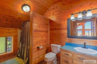 This 3,201 square foot cabin is conveniently located at the IP on Island Park Village Resort Golf Course in Idaho - for sale on GolfHomes.com, golf home, golf lot