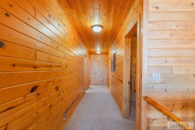 This 3,201 square foot cabin is conveniently located at the IP on Island Park Village Resort Golf Course in Idaho - for sale on GolfHomes.com, golf home, golf lot