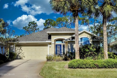 Welcome to your next haven with a scenic backyard view of the on Plantation Bay Golf and Country Club in Florida - for sale on GolfHomes.com, golf home, golf lot