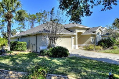 Welcome to your next haven with a scenic backyard view of the on Plantation Bay Golf and Country Club in Florida - for sale on GolfHomes.com, golf home, golf lot