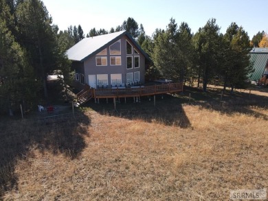 This 3,201 square foot cabin is conveniently located at the IP on Island Park Village Resort Golf Course in Idaho - for sale on GolfHomes.com, golf home, golf lot