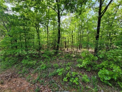 This nearly level lot is practically across the street from the on Branchwood Golf Course in Arkansas - for sale on GolfHomes.com, golf home, golf lot