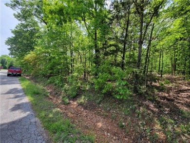 This nearly level lot is practically across the street from the on Branchwood Golf Course in Arkansas - for sale on GolfHomes.com, golf home, golf lot