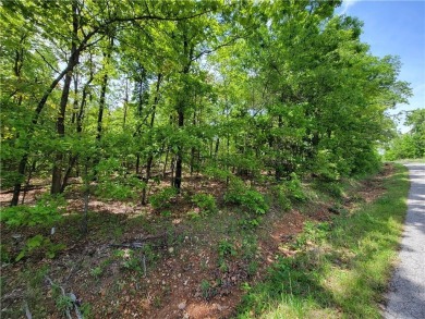This nearly level lot is practically across the street from the on Branchwood Golf Course in Arkansas - for sale on GolfHomes.com, golf home, golf lot