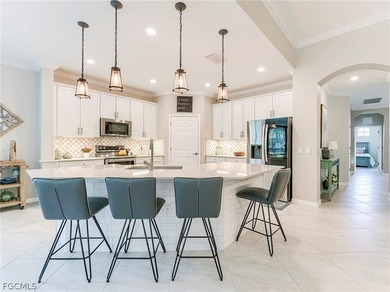 This rare second-floor carriage home in the Casella neighborhood on Pelican Preserve Golf Club in Florida - for sale on GolfHomes.com, golf home, golf lot