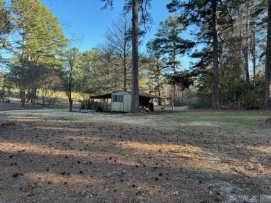 Charming Country Home with Golf Course View! Nestled on a on Camden Country Club in Arkansas - for sale on GolfHomes.com, golf home, golf lot