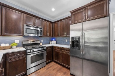 Welcome home to this beautiful condo in Iowa City's highly on Elks Lodge 590 in Iowa - for sale on GolfHomes.com, golf home, golf lot