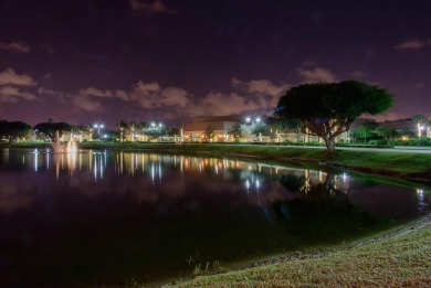 otally turnkey f, contemporary condominium in gated Kings Point on Kings Point Golf -Flanders Way in Florida - for sale on GolfHomes.com, golf home, golf lot