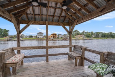 Welcome to this exquisite waterfront residence along the Intra on Arrowhead Country Club in South Carolina - for sale on GolfHomes.com, golf home, golf lot