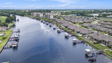 Welcome to this exquisite waterfront residence along the Intra on Arrowhead Country Club in South Carolina - for sale on GolfHomes.com, golf home, golf lot