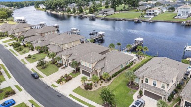 Welcome to this exquisite waterfront residence along the Intra on Arrowhead Country Club in South Carolina - for sale on GolfHomes.com, golf home, golf lot