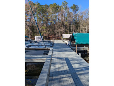 Welcome to the highly sought-after, gated Santee Cooper Resort on Santee-Cooper Country Club in South Carolina - for sale on GolfHomes.com, golf home, golf lot