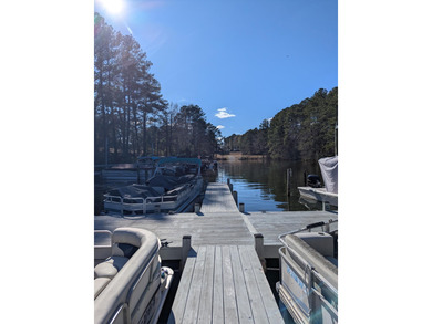 Welcome to the highly sought-after, gated Santee Cooper Resort on Santee-Cooper Country Club in South Carolina - for sale on GolfHomes.com, golf home, golf lot