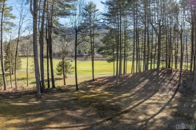 Perched majestically above the eighth fairway and green of the on The Country Club of Sapphire Valley in North Carolina - for sale on GolfHomes.com, golf home, golf lot