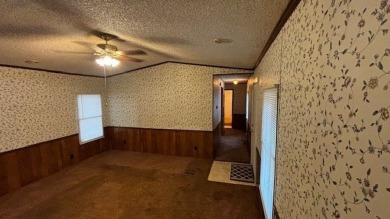 Discover affordable lake-area living in Pendleton Harbor, a on Pendleton Harbor in Texas - for sale on GolfHomes.com, golf home, golf lot