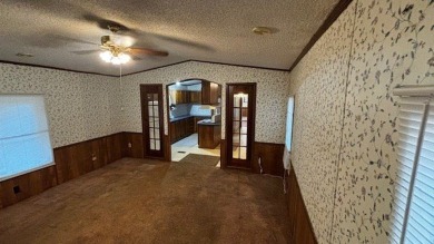 Discover affordable lake-area living in Pendleton Harbor, a on Pendleton Harbor in Texas - for sale on GolfHomes.com, golf home, golf lot
