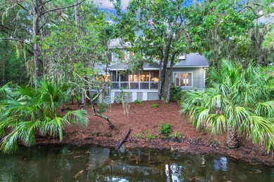 This impeccably maintained & elegantly presented lagoon front on The Seabrook Island Club in South Carolina - for sale on GolfHomes.com, golf home, golf lot
