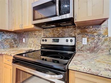 Immaculate & Well Maintained RHAPSODY model on a serene on Poinciana Golf Club in Florida - for sale on GolfHomes.com, golf home, golf lot