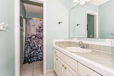 Tucked away in a quiet Gulf Breeze neighborhood, this on Tiger Point Golf and Country Club in Florida - for sale on GolfHomes.com, golf home, golf lot