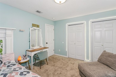 Tucked away in a quiet Gulf Breeze neighborhood, this on Tiger Point Golf and Country Club in Florida - for sale on GolfHomes.com, golf home, golf lot