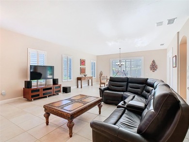 Immaculate & Well Maintained RHAPSODY model on a serene on Poinciana Golf Club in Florida - for sale on GolfHomes.com, golf home, golf lot