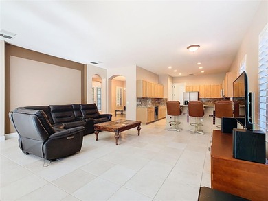 Immaculate & Well Maintained RHAPSODY model on a serene on Poinciana Golf Club in Florida - for sale on GolfHomes.com, golf home, golf lot