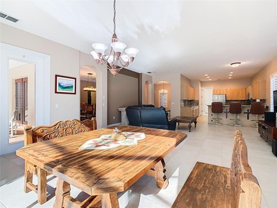 Immaculate & Well Maintained RHAPSODY model on a serene on Poinciana Golf Club in Florida - for sale on GolfHomes.com, golf home, golf lot