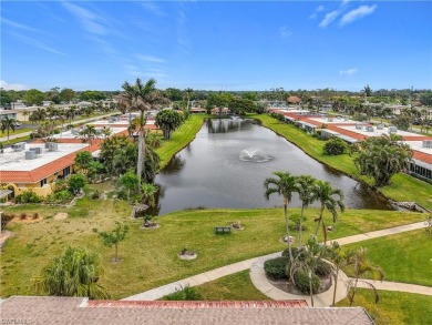 Wake up to stunning lake views every day in this charming on The Glades Golf and Country Club in Florida - for sale on GolfHomes.com, golf home, golf lot