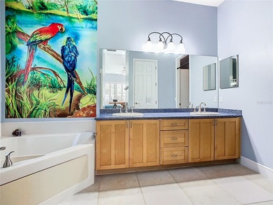 Immaculate & Well Maintained RHAPSODY model on a serene on Poinciana Golf Club in Florida - for sale on GolfHomes.com, golf home, golf lot