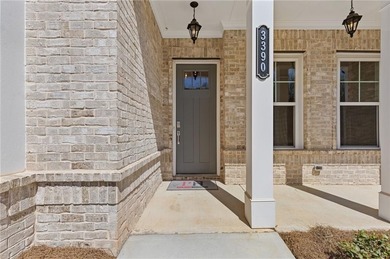 Nestled in the sought-after Traditions of Braselton community on Traditions of Braselton Golf Club in Georgia - for sale on GolfHomes.com, golf home, golf lot