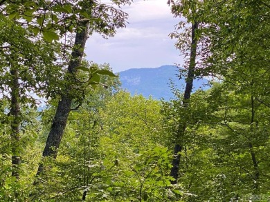 Enjoy stunning vistas of the distinguished Whiteside Mountain on Headwaters Golf Club in North Carolina - for sale on GolfHomes.com, golf home, golf lot