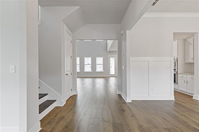 Nestled in the sought-after Traditions of Braselton community on Traditions of Braselton Golf Club in Georgia - for sale on GolfHomes.com, golf home, golf lot